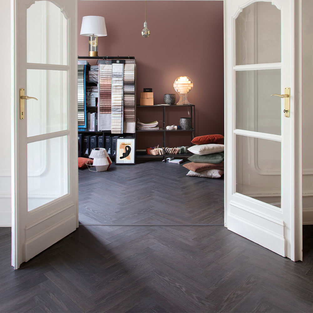 Berry Alloc Chateau 8mm Charme Black Herringbone Laminate - homes-and-floors
