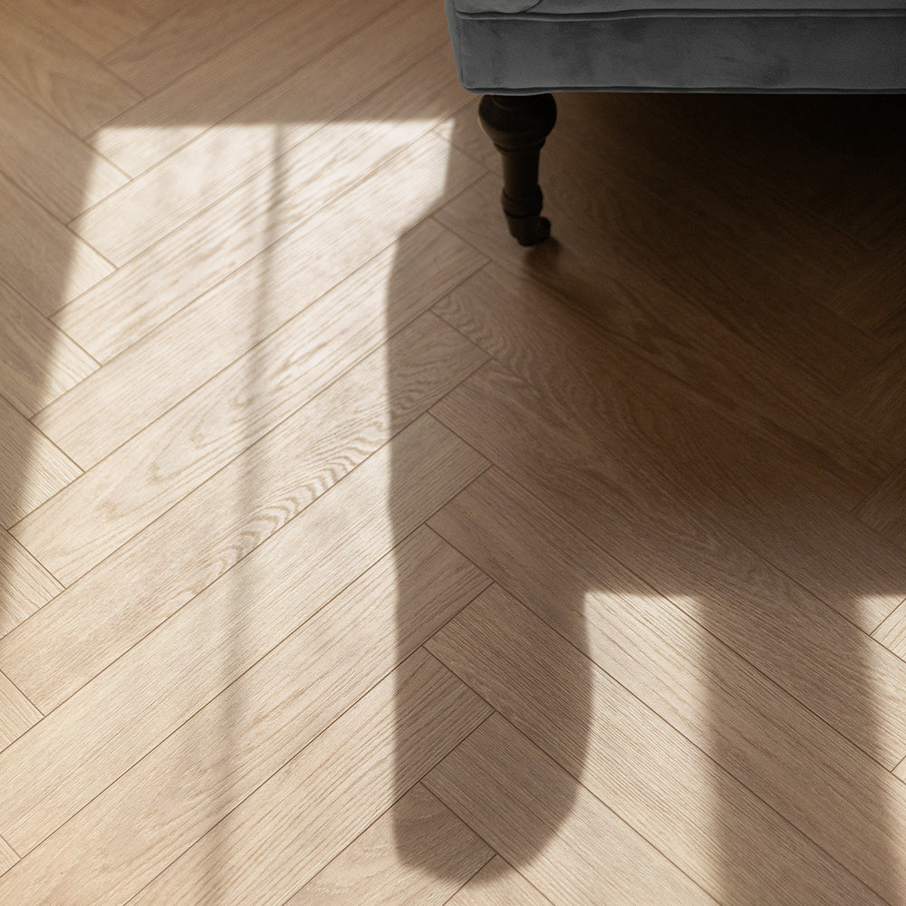 Berry Alloc Chateau 8mm Charme Light Natural Herringbone Laminate - homes-and-floors
